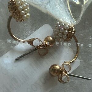 Earrings with small pearls. Not real pearls but look nice